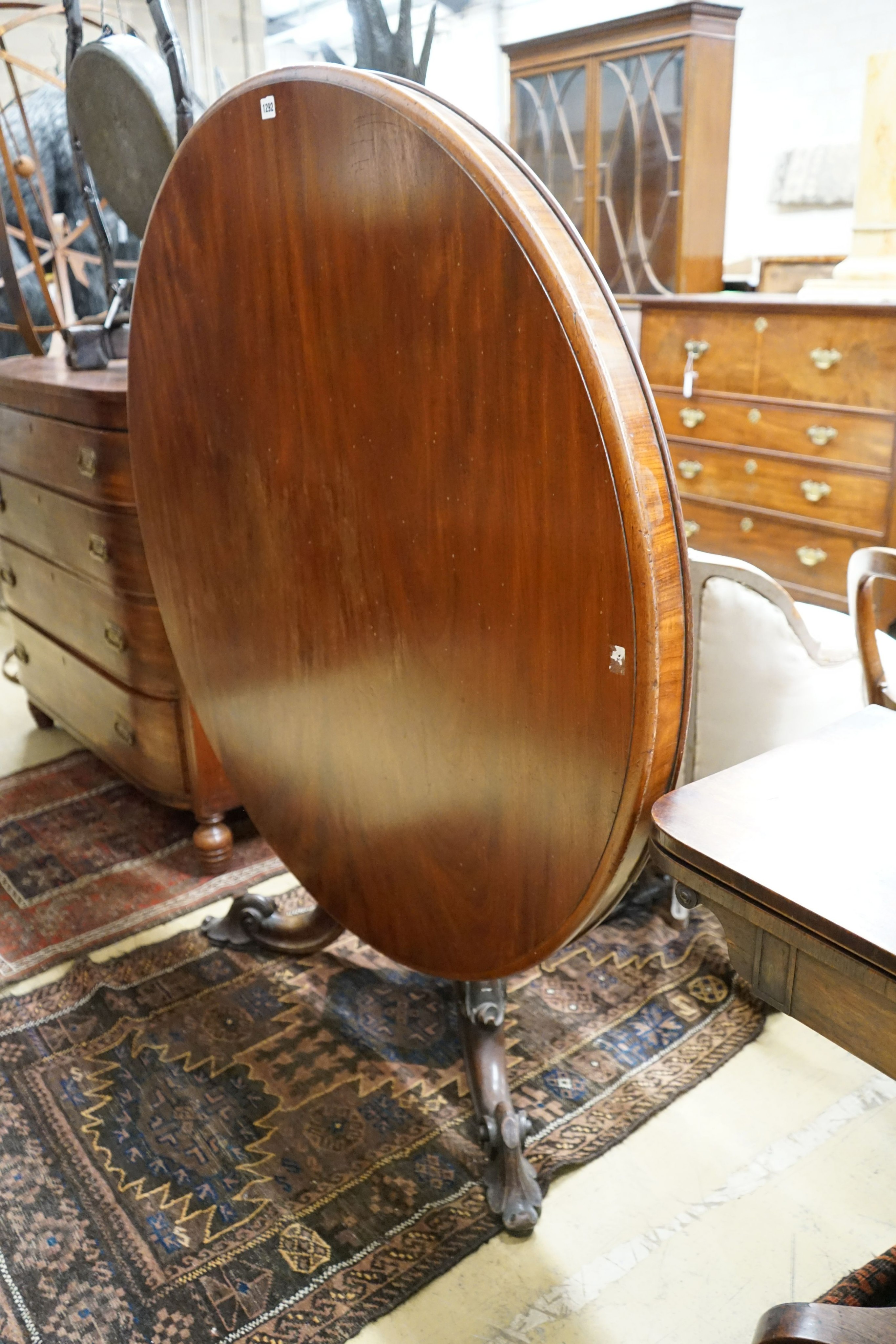 A Victorian mahogany circular tilt top breakfast table, diameter 126cm, height 72cm